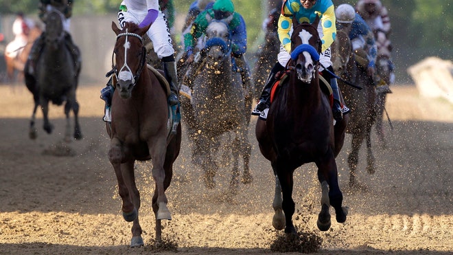 Jockey Mario Gutierrez, left,.jpg